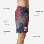 close detail of distressed cracked-paint star graphic and white outlined number on red and navy basketball shorts