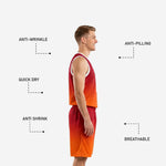 Full set view of custom red and orange sublimated basketball uniform with matching gradient jersey and shorts laid flat