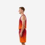 Reverse side view of personalized red and orange mesh basketball uniform showing gradient fade from waistband to hem on shorts