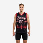 Custom red and black basketball jerseys with glowing heartbeat graphic, arced team name, and white front number on a black sublimated jersey with red V-neck and armhole trim