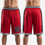 Size and spec sheet for custom red and black basketball shorts showing youth through adult sizing and print zone layout