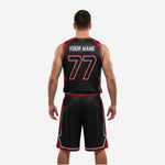 Opposite side view of custom sublimated red and black basketball uniform displaying the full red side panel detail on both jersey and shorts