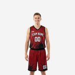 Red and black basketball uniforms with splash pattern, V-neck jersey and matching shorts, team name arced across the chest, front and back view