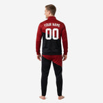 Diagonal colorblock detail on custom red and black soccer tracksuit jacket and matching pants