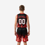 Left-side view of custom red and black youth basketball uniform showing V-neck collar trim and matching shorts