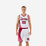 Custom red and white basketball uniforms with crimson curved side panel, V-neck jersey and matching shorts, front view full set