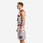 Side view of red and white custom basketball uniform set showing red armhole binding and matching lightning graphic on jersey and shorts