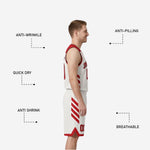 Close-up detail of white chevron arrowhead side panels on red reversible basketball jersey with black contrast outline