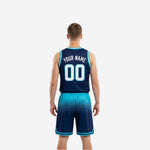 Right side view of custom red and white reversible basketball uniform set showing armhole binding and shorts hem detail