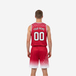 Side view of red and white reversible basketball uniform showing armhole binding and side panel construction