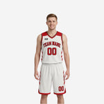 Custom reversible basketball uniform white side front view with red chevron panels arced team name in red and number 00 on white jersey and shorts