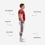 Right side view of custom youth football uniform in red and white with number 7 on sleeve and full-length pant side stripe