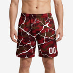 Custom red basketball shorts in crimson and brown camo crackle pattern with white player number on front leg, front view