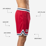 Detail view of custom red basketball shorts showing navy-outlined number 00 on thigh and chevron stripe construction