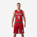 Close detail of red and black basketball uniform kit showing geometric sublimation pattern and number placement