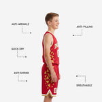 Opposite side view of custom red youth basketball uniform displaying continuous gold triangle design across jersey and shorts side panels