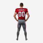Right side view of custom red and gray football uniform for teams showing jersey hem and pant belt area with buckle closure