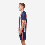 Right side view of red and navy striped soccer team kit with side stripe shorts