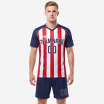 Custom red and navy vertical stripe soccer uniform kit with matching navy shorts, front view