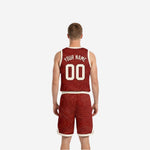 Side view of maroon-red reversible basketball jersey showing topographic contour sublimation pattern and cream-white armhole binding detail