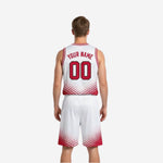 Side view of red and white reversible basketball uniform set showing armhole binding and side panel construction