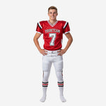 Custom youth football uniform sets in red and white with black accents, V-neck jersey with front number 7 and team name, matching white pants with red and black side stripe, front view