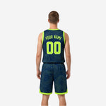 Navy side view of reversible basketball jersey and shorts showing lime green armhole binding and contour-line sublimation pattern
