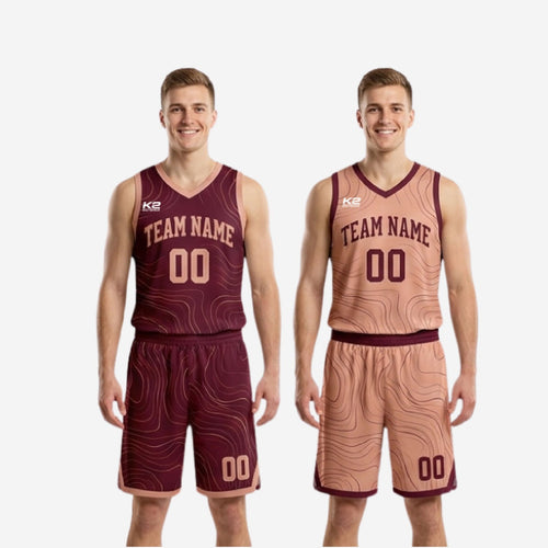Full set view of the maroon and blush reversible basketball uniform - reversible jersey and matching shorts displayed together