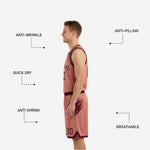 Size and specification sheet for the custom reversible basketball uniform set in maroon and dusty rose, showing youth and adult sizing