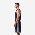 Purple and silver basketball uniform kit right side profile showing shorts thigh number and reversible construction