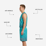 Close detail of reversible basketball shorts showing charcoal side halftone dot fade at hem and player number on right leg