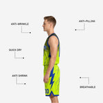 Close-up of reversible basketball shorts showing lightning bolt sublimated pattern, drawcord waistband, and neon hem trim