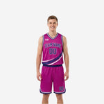 Front view of purple and magenta reversible basketball jersey and shorts with diagonal swoosh stripe and white V-neck binding on male model