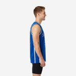 Side view of royal blue basketball jersey showing white contrast side panel running full length from armhole binding to straight hem