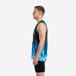 Left side view of black and royal blue sublimated basketball jersey showing flame pattern wrapping around the sides