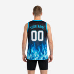 Right side view of men's custom royal blue basketball jersey showing flame graphic and cyan armhole binding detail