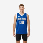 Custom royal blue basketball jerseys with white V-neck binding, arced team name on chest, and front number 00 on adult male model