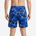 Back view of royal blue basketball shorts showing full-dye sublimation camo crack print and clean hem finish