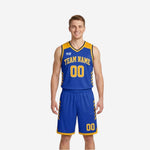 Royal blue and gold reversible basketball uniforms front view showing arched team name, number 00, and diagonal gold chevron side panels on blue jersey and matching shorts