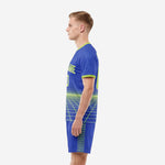 Right side view of a Royal Blue Neon Green custom blue soccer uniform displaying the back number and shorts grid side stripe detail