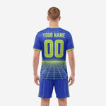 Close detail of the Royal Blue sublimated soccer jersey with Neon Green arched team name, front number, and crew-neck trim