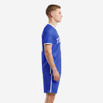 Custom Royal Blue soccer kit left side view showing white sleeve trim and pinstripe jersey pattern