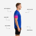 Sleeve closeup of custom blue soccer training jersey showing hot pink to violet gradient fading into Royal Blue body