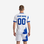 Detail view of Royal Blue splash print on custom blue and white soccer jersey with crew neckline trim
