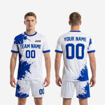 Full custom blue and white soccer uniform kit showing jersey and shorts in Royal Blue splash design