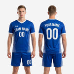 Full 2-piece Royal Blue and white stripe panel custom soccer uniform set jersey and shorts worn by adult male model