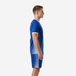 Side view of Royal Blue and white stripe panel blue and white soccer uniforms showing radiating white stripe design on jersey and shorts