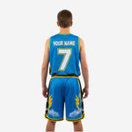 Back view of custom royal blue youth basketball uniform showing player number placement and sublimated lightning bolt design on jersey and shorts