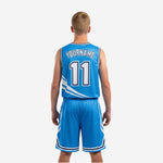 Opposite side view of royal blue youth basketball uniform set showing the clean blue side panel and shorts waistband detail