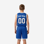 Opposite side view of royal blue kids basketball team uniform showing elastic waistband drawcord shorts and sleeveless jersey athletic cut